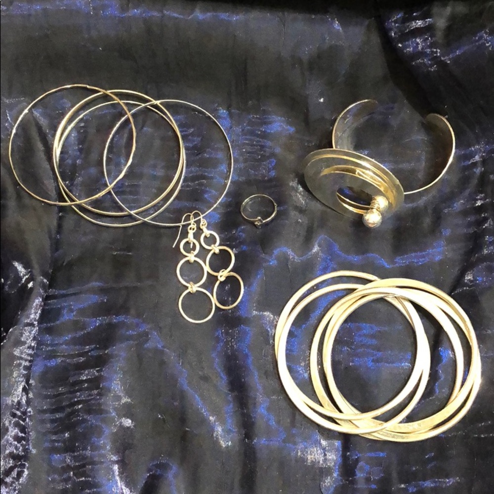 Three Sets of Bracelets, a Ring and Earrings